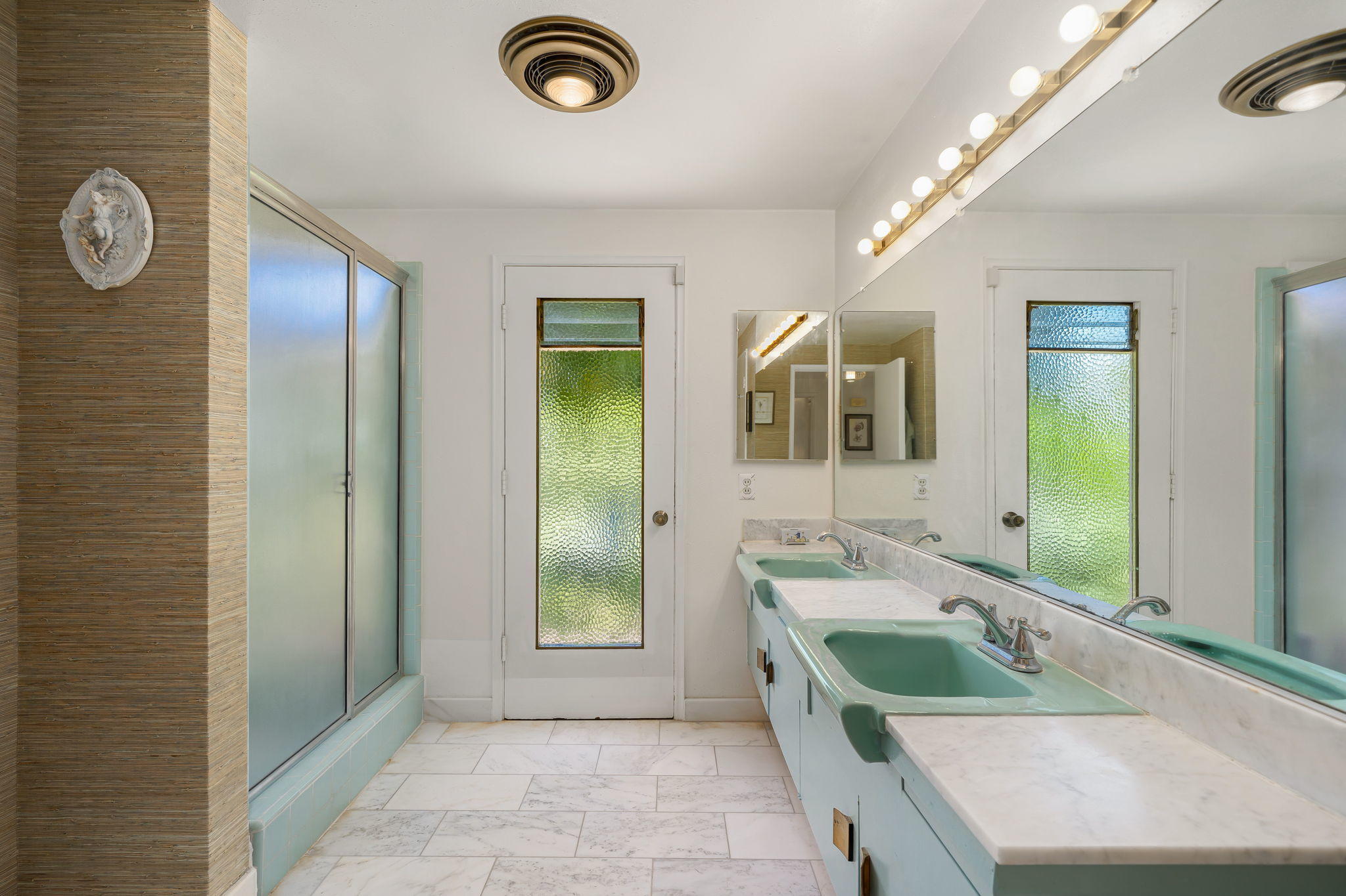 70418 Tamarisk Lane Rancho Mirage, CA 92270 - Photo 37 of 41 a bathroom with a granite countertop sink and a large mirror