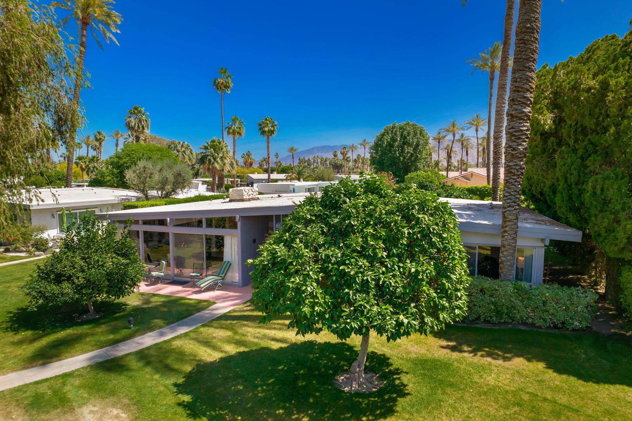 70418 Tamarisk Lane Rancho Mirage, CA 92270 - Photo 7 of 41 a view of a house with a yard