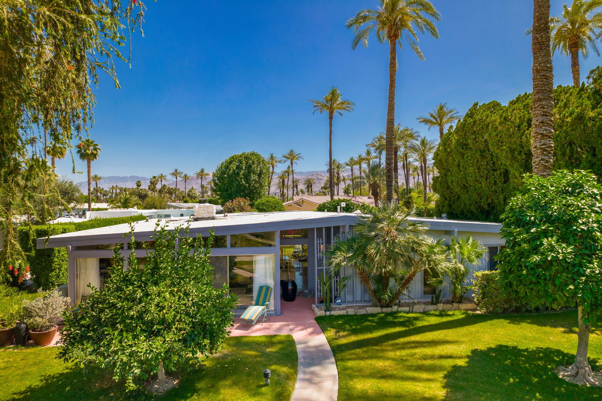 70418 Tamarisk Lane Rancho Mirage, CA 92270 - Photo 8 of 41 a view of a swimming pool with a yard