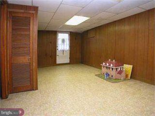 867 Kent Lane Philadelphia, PA 19115 - Photo 5 of 6 a view of an empty room with a fireplace