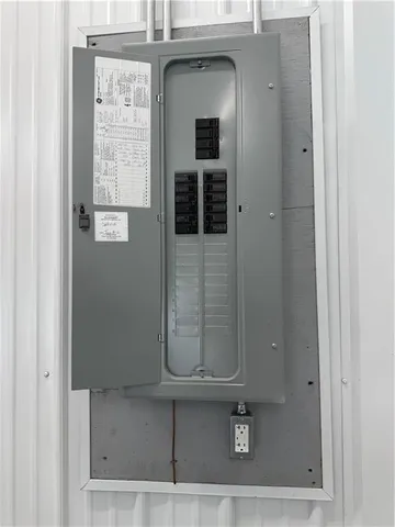 a bed room with a bed and a window