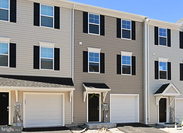 a view of a porch with wooden door