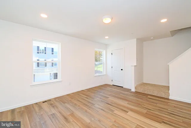 a view of a room that has a window in it