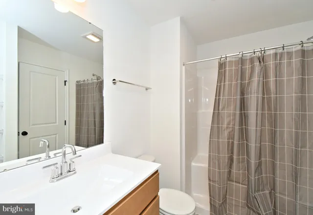 a view of a room that has a window in it