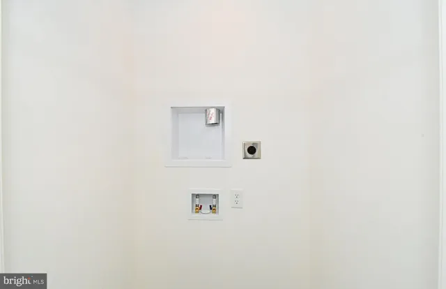 a view of a livingroom with wooden floor