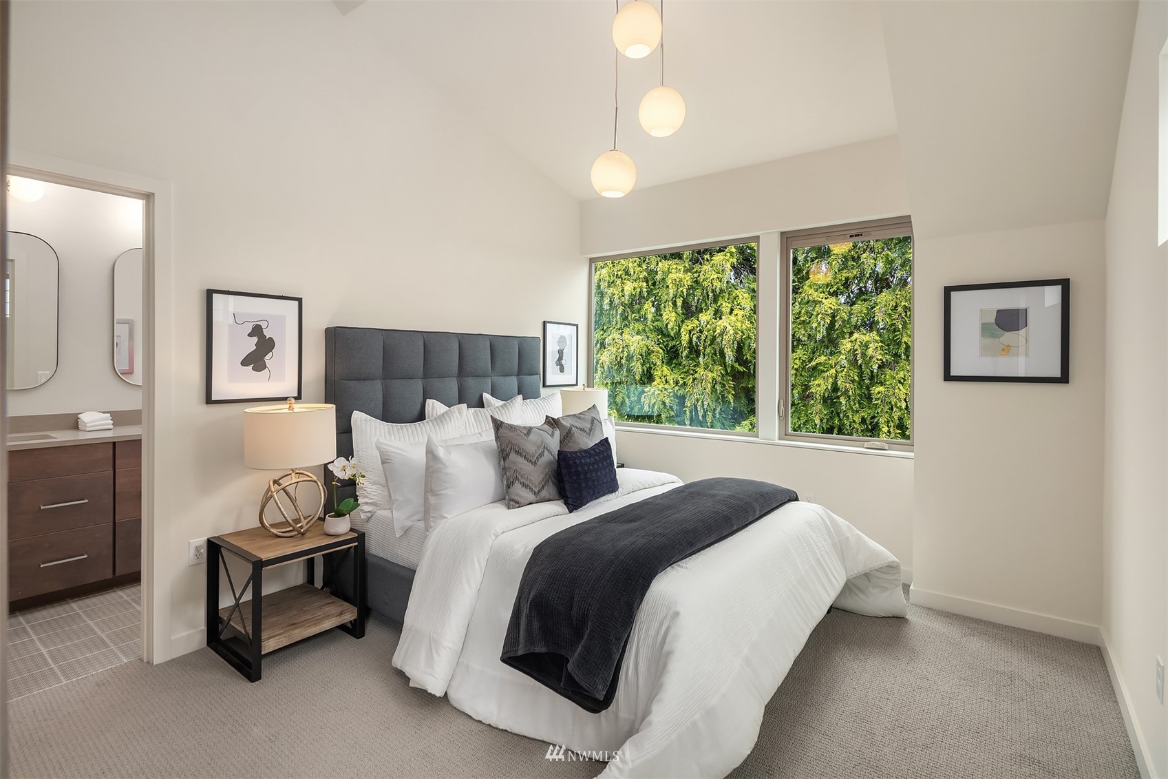 750 North 68th Street, Unit B Seattle, WA 98103 - Photo 13 of 19 a bed room with a bed and a couch