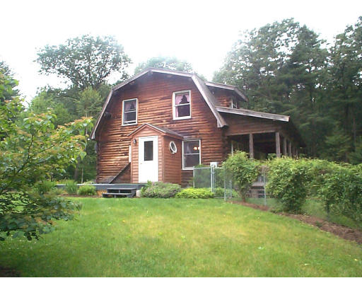 741 Bay Road Amherst, MA 01002 - Photo 1 of 1 a front view of a house with a yard