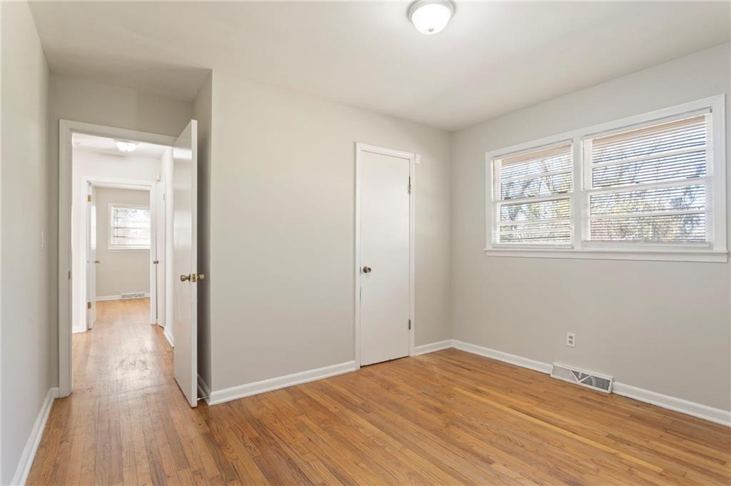 419 East 13th Street Rome, GA 30161 - Photo 11 of 27 a view of a room with wooden floor and windows