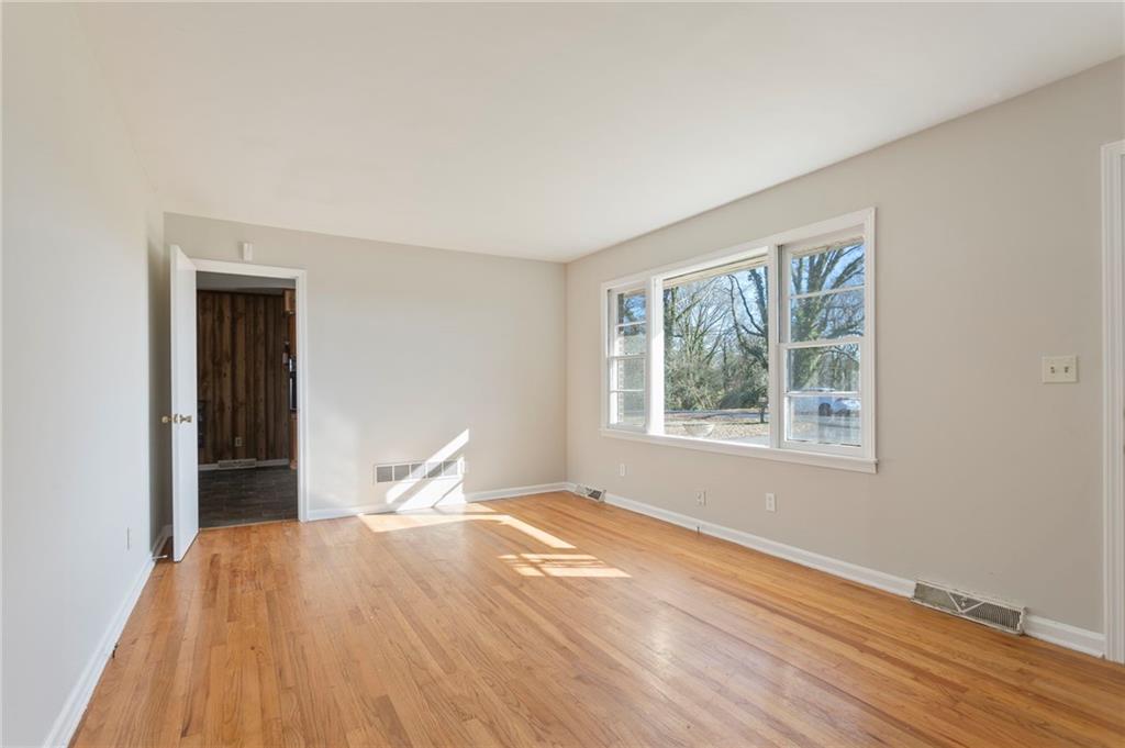 419 East 13th Street Rome, GA 30161 - Photo 6 of 27 a bedroom with a bed and a window