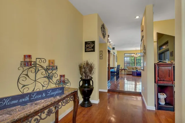 a view of a livingroom with furniture and front door