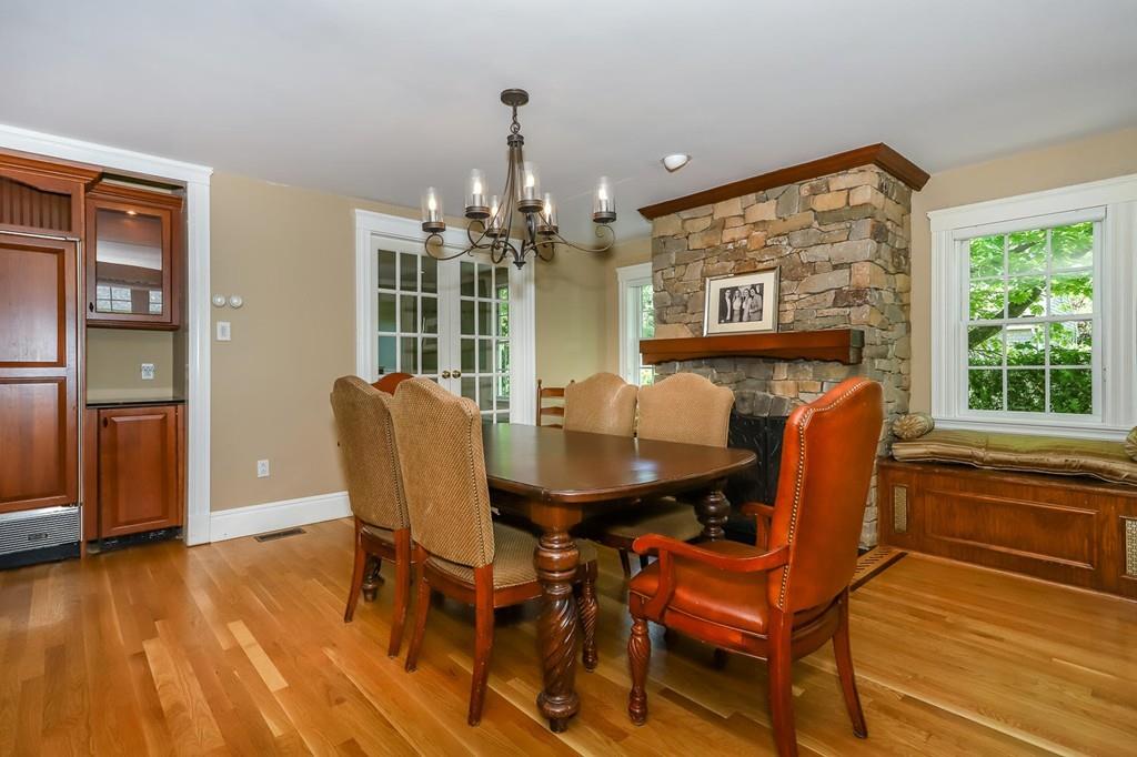 6 Colonial Lane Canton, MA 02021 - Photo 8 of 42 a view of a dining room with furniture window and wooden floor