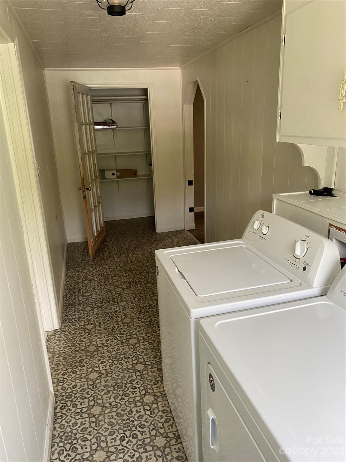 17183 Pond Road Locust, NC 28097 - Photo 12 of 14 a utility room with dryer and washer