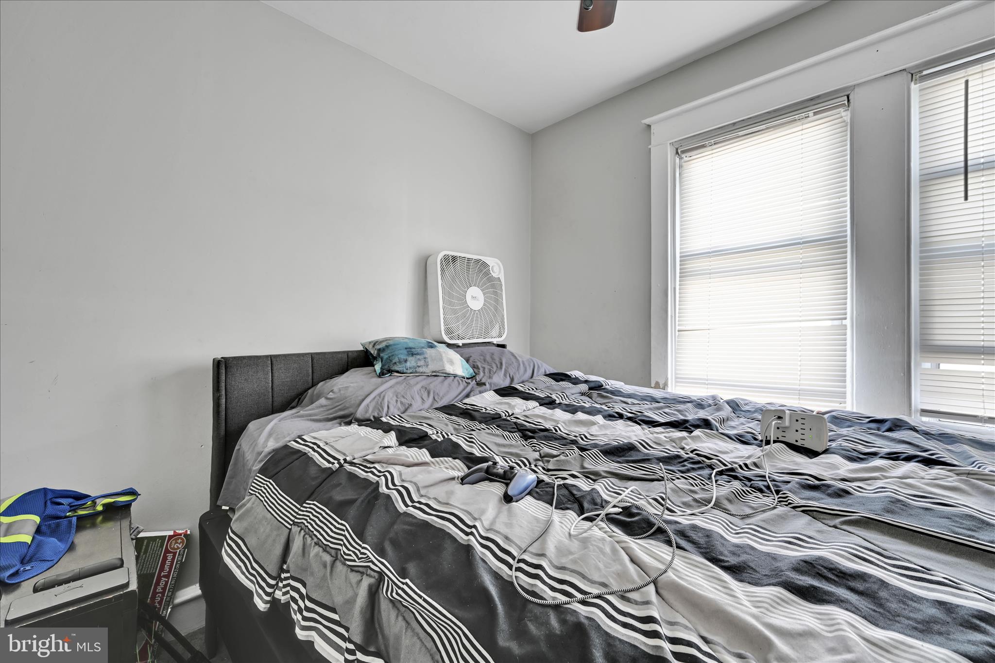 204 East Avon Road Brookhaven, PA 19015 - Photo 14 of 26 a bed sitting in a bedroom next to a window