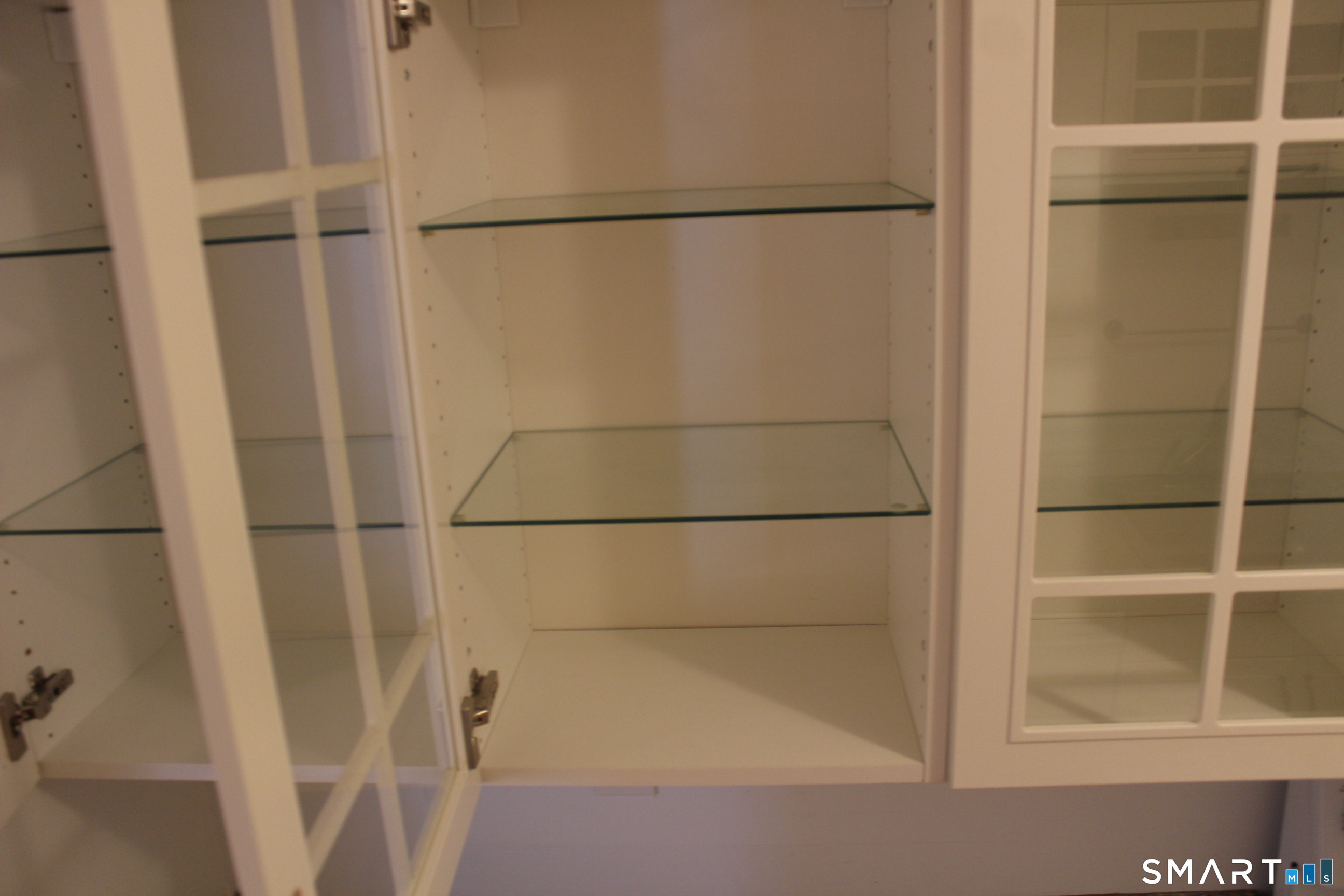 1 Concorde Way, Unit B4 Windsor Locks, CT 06096 - Photo 25 of 40 a bathroom with a glass shower door