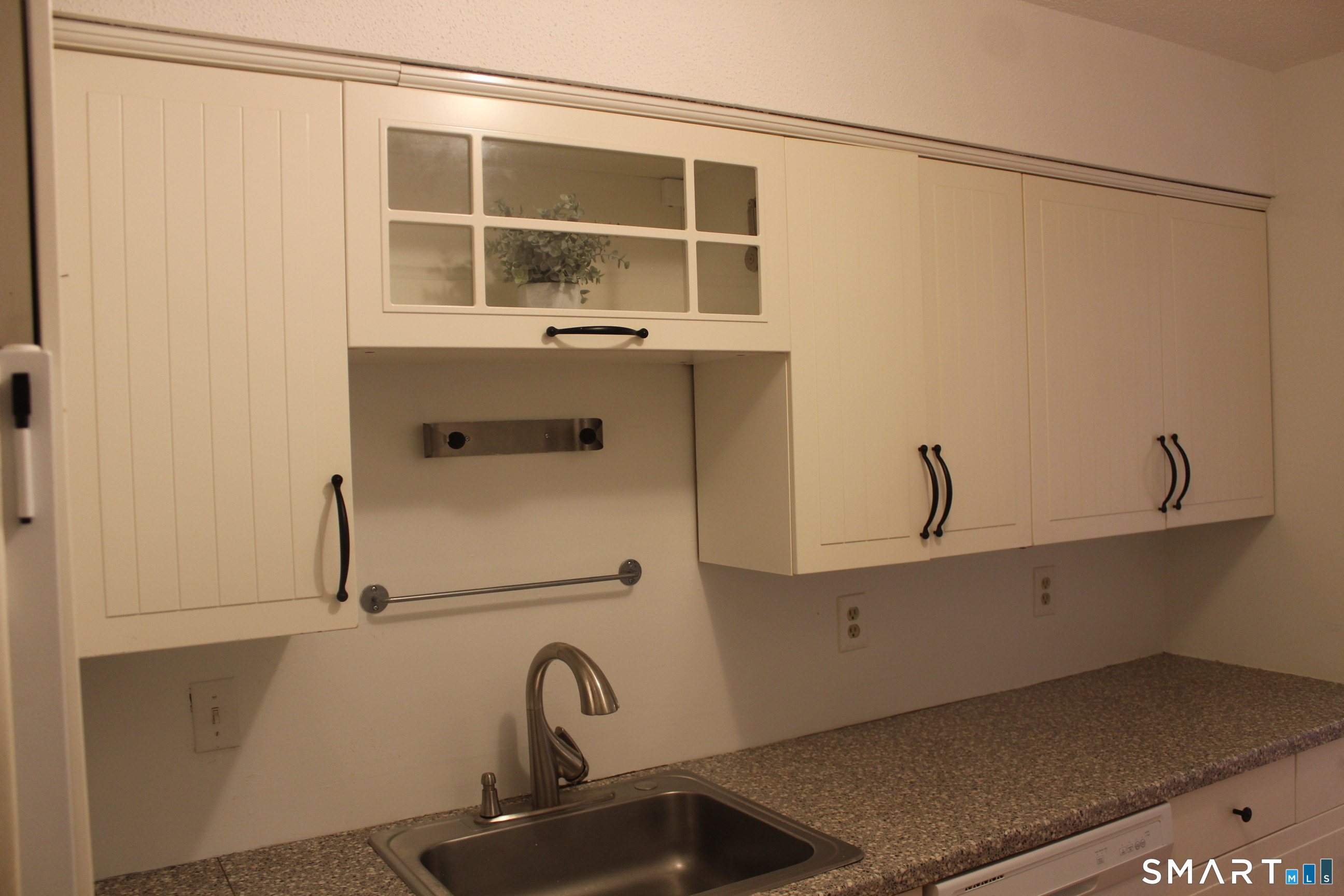 1 Concorde Way, Unit B4 Windsor Locks, CT 06096 - Photo 29 of 40 a bathroom with a sink and mirror