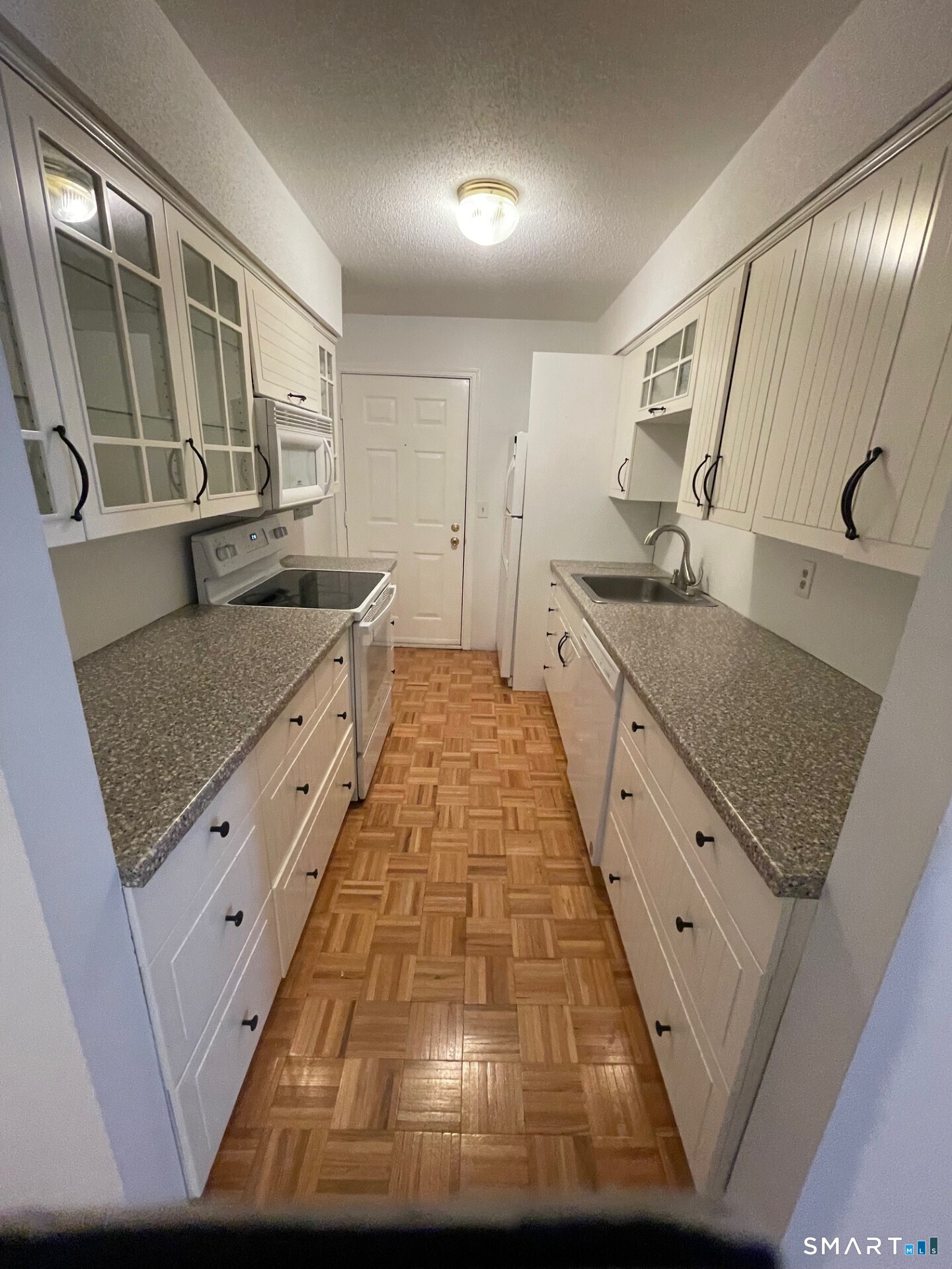 1 Concorde Way, Unit B4 Windsor Locks, CT 06096 - Photo 3 of 40 a bathroom with a granite countertop sink
