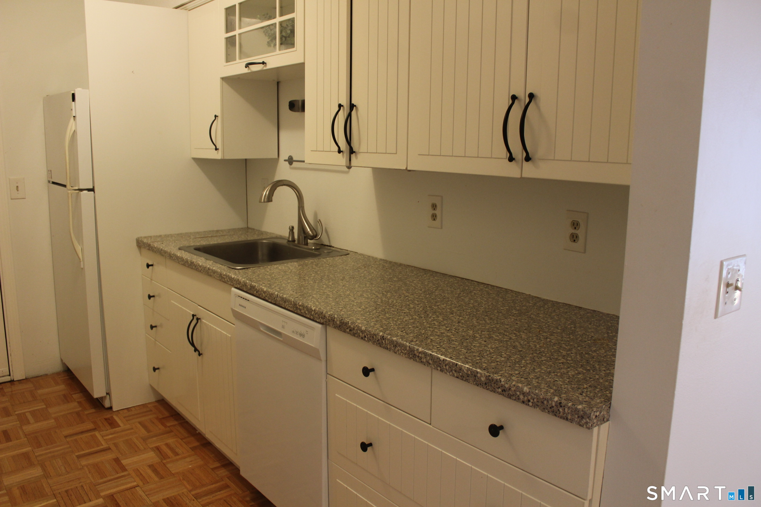 1 Concorde Way, Unit B4 Windsor Locks, CT 06096 - Photo 32 of 40 a close view of sink and tap
