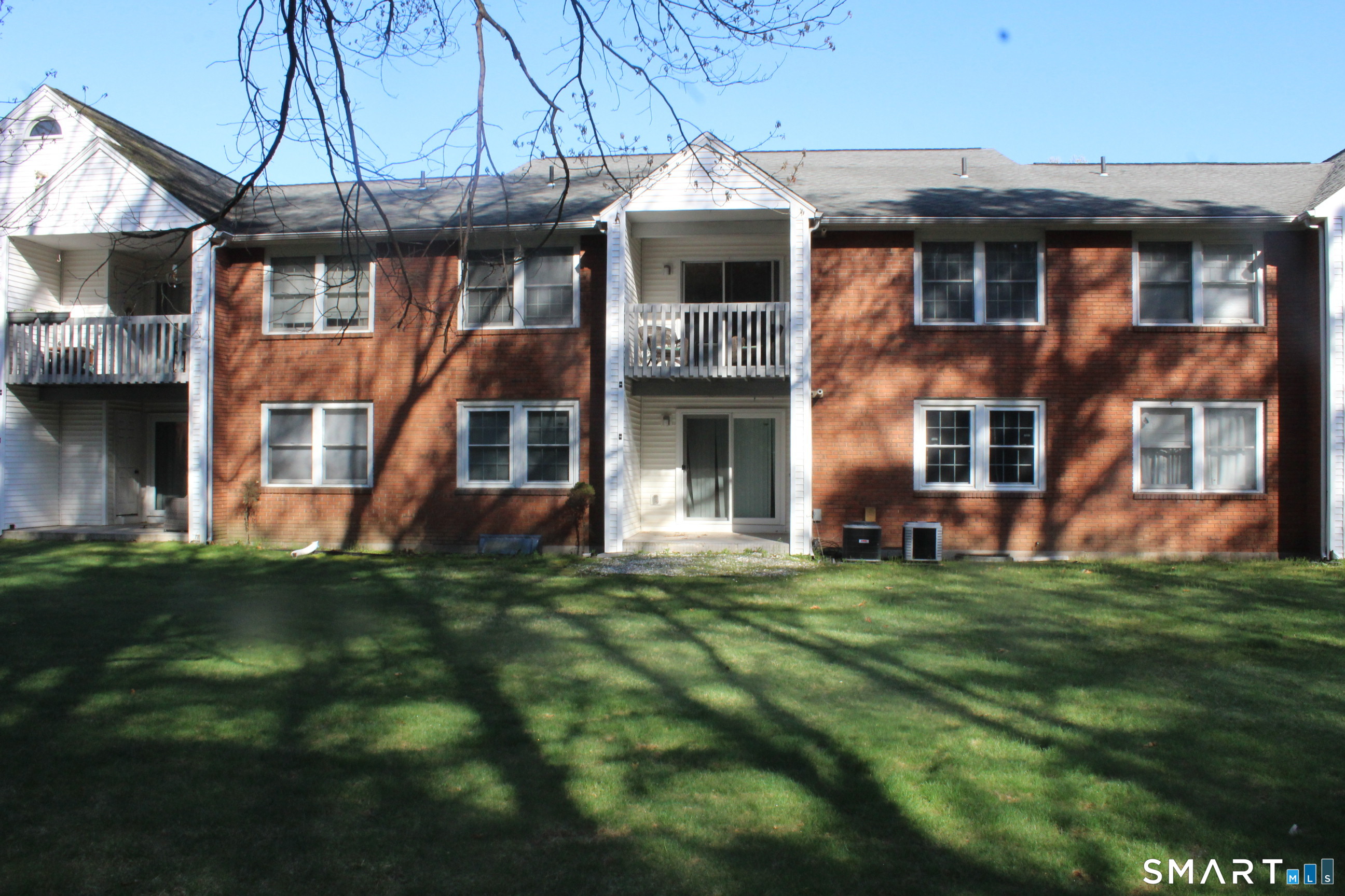 1 Concorde Way, Unit B4 Windsor Locks, CT 06096 - Photo 38 of 40 a front view of a house with a garden