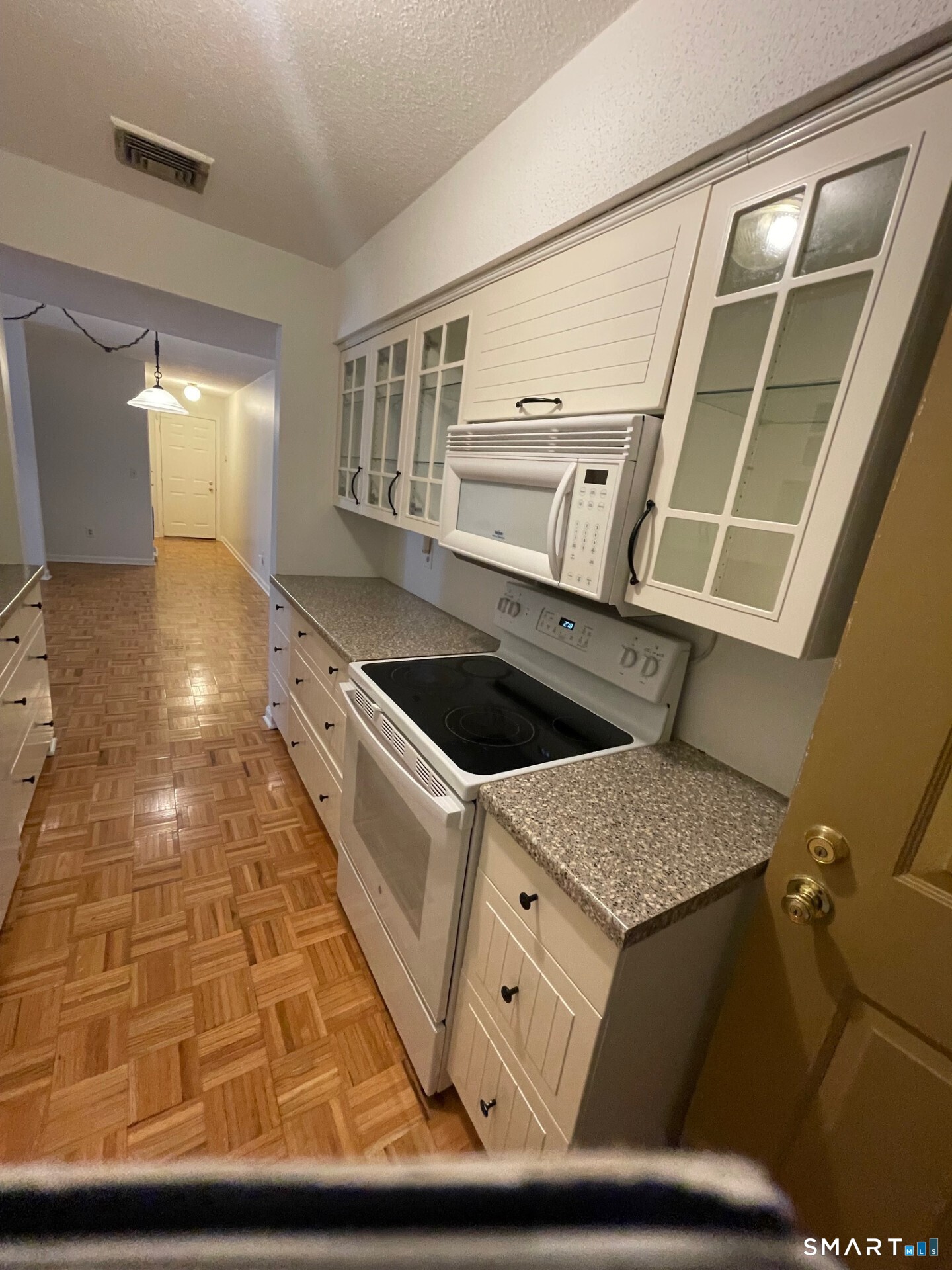 1 Concorde Way, Unit B4 Windsor Locks, CT 06096 - Photo 6 of 40 a kitchen with a sink and cabinets