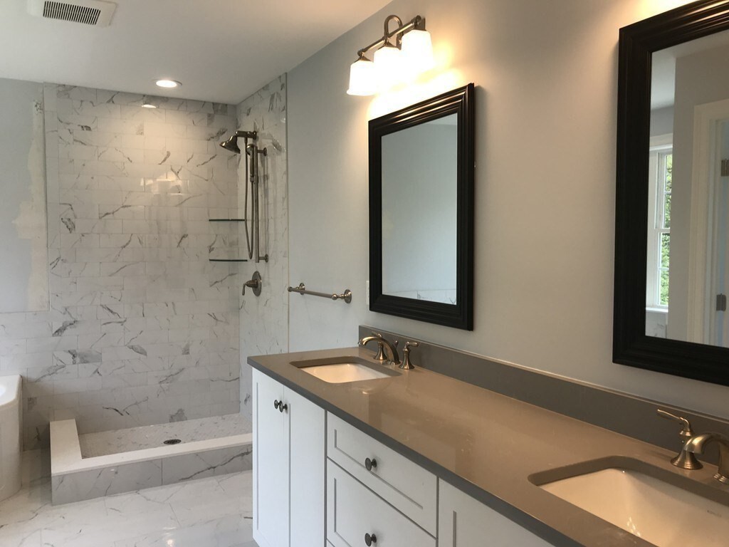 53 Wellesley Rd Extension Natick, MA 01760 - Photo 15 of 27 a bathroom with a granite countertop sink mirror and a bathtub