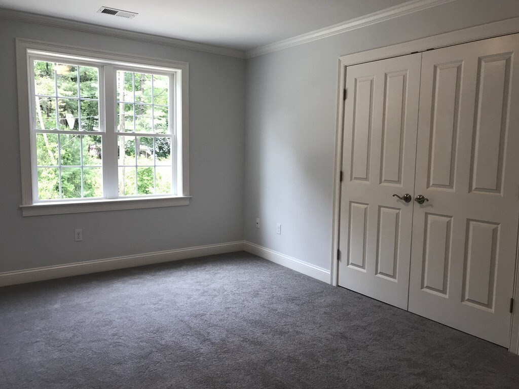 53 Wellesley Rd Extension Natick, MA 01760 - Photo 18 of 27 an empty room with a window