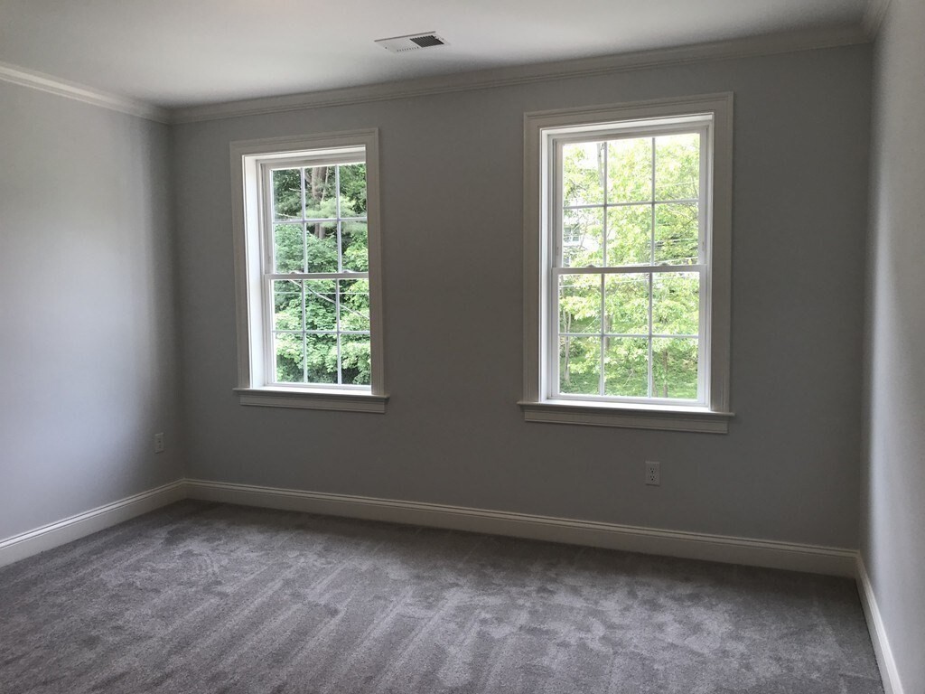 53 Wellesley Rd Extension Natick, MA 01760 - Photo 20 of 27 an empty room with a window