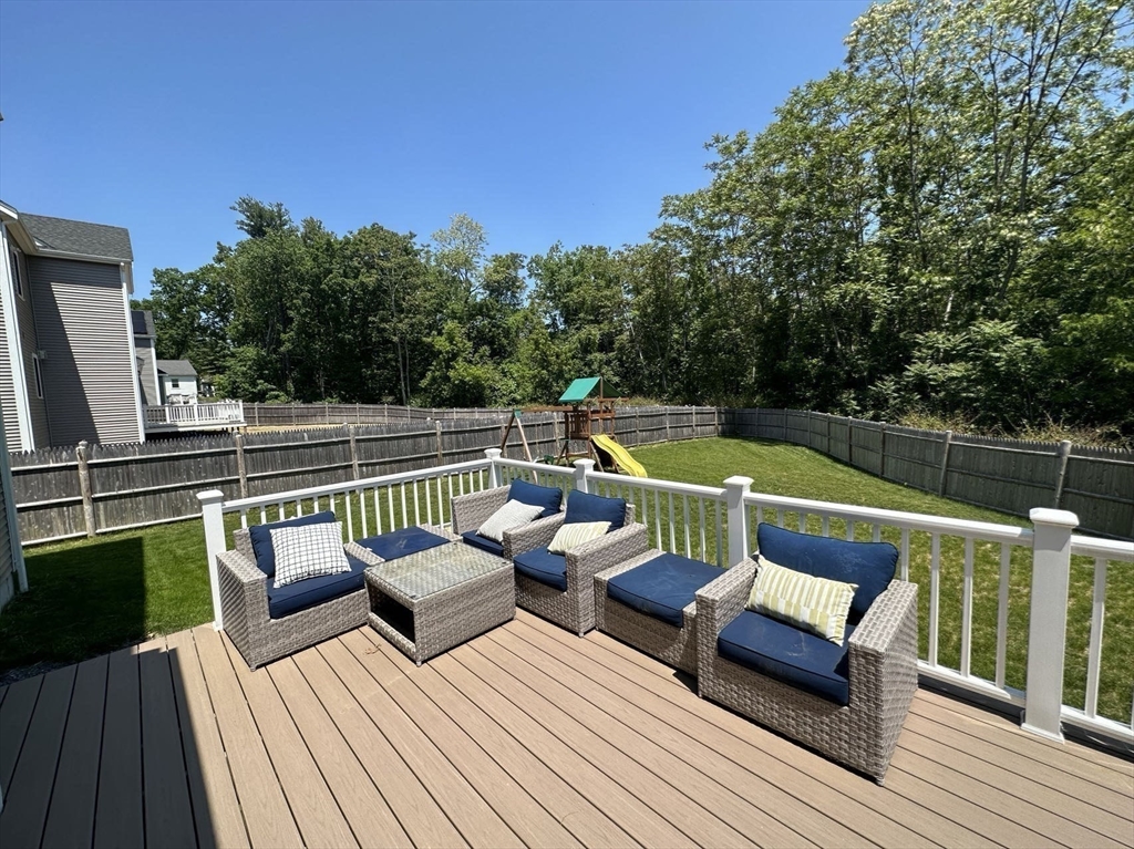53 Wellesley Rd Extension Natick, MA 01760 - Photo 25 of 27 a view of sitting area with furniture on wooden floor