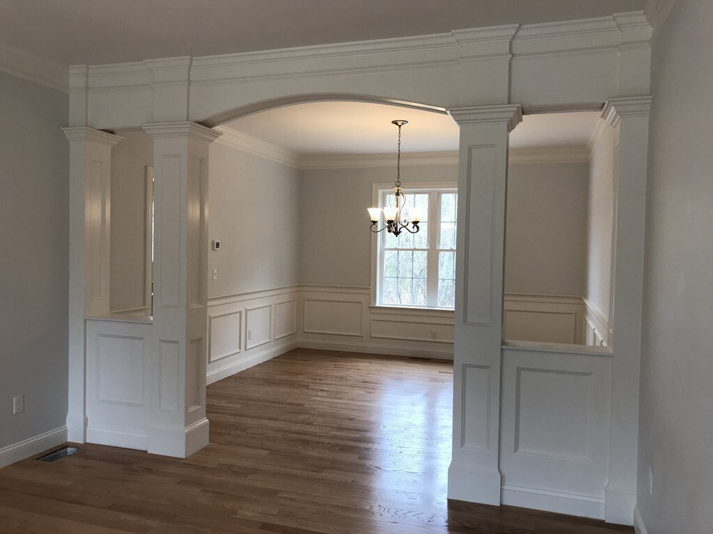 53 Wellesley Rd Extension Natick, MA 01760 - Photo 9 of 27 a view of empty room with wooden floor and fan