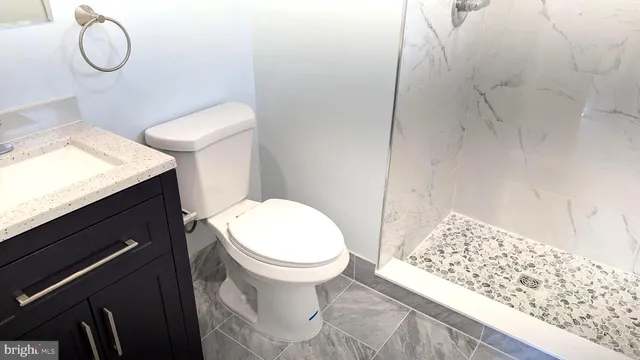 a bathroom with a sink and a toilet
