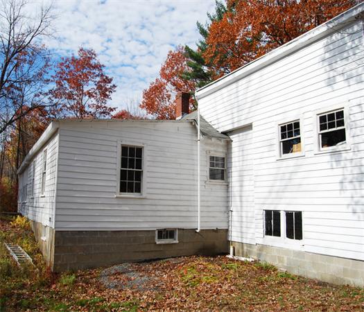 110 Whitney Road Ashby, MA 01431 - Photo 11 of 15 a view of a house with a yard
