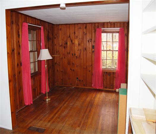 110 Whitney Road Ashby, MA 01431 - Photo 5 of 15 a view of a room with wooden floor and windows