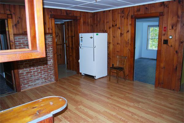 110 Whitney Road Ashby, MA 01431 - Photo 7 of 15 an entryway with wooden floor and cabinet