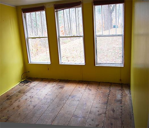 110 Whitney Road Ashby, MA 01431 - Photo 8 of 15 a view of an empty room with a window