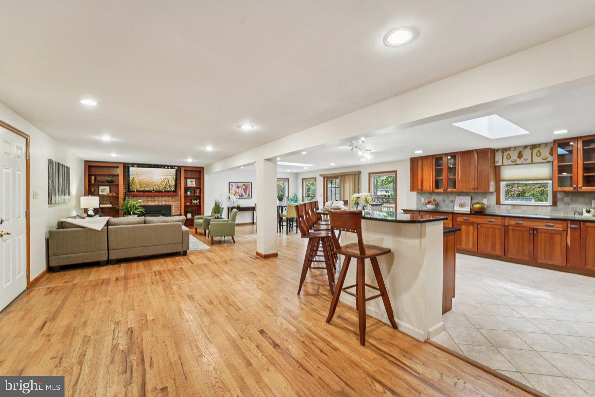 14820 Windmill Terrace Silver Spring, MD 20905 - Photo 12 of 33 a living room with furniture and a wooden floor