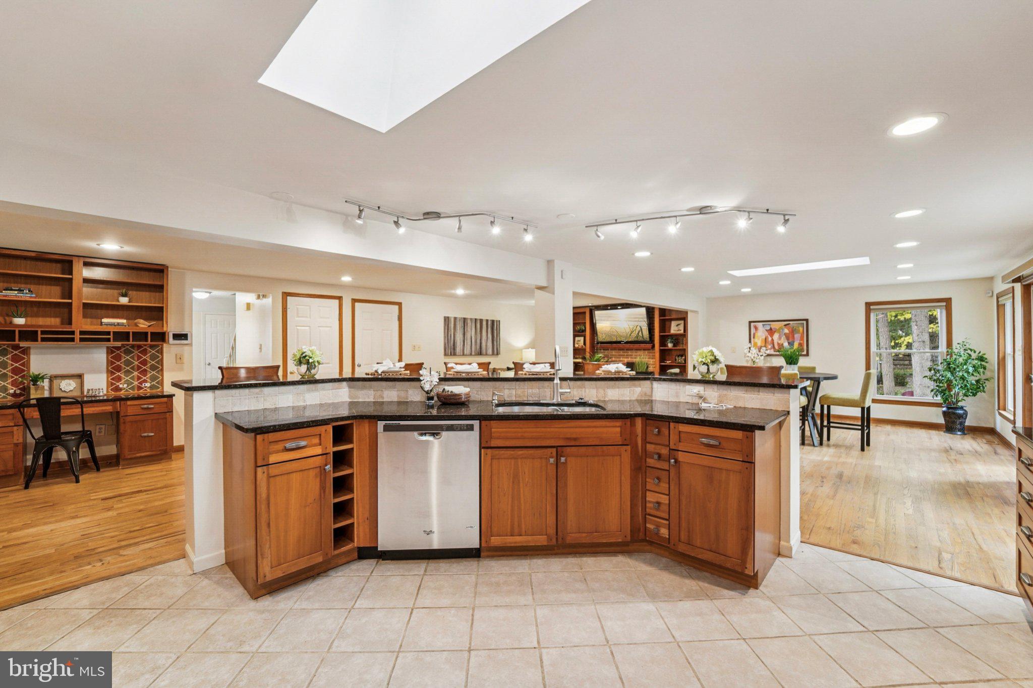 14820 Windmill Terrace Silver Spring, MD 20905 - Photo 13 of 33 a kitchen with a sink and cabinets