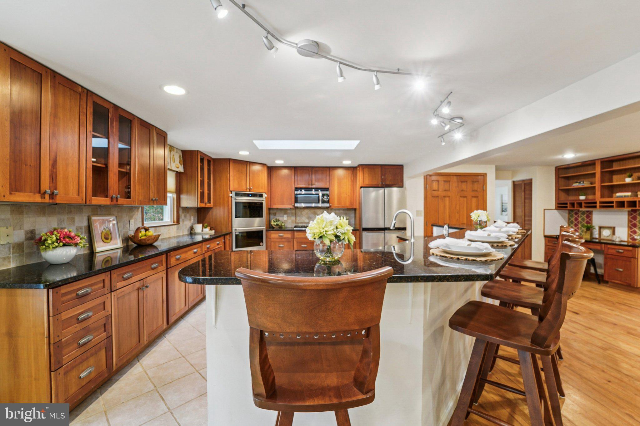 14820 Windmill Terrace Silver Spring, MD 20905 - Photo 2 of 33 a view of a kitchen and dining room