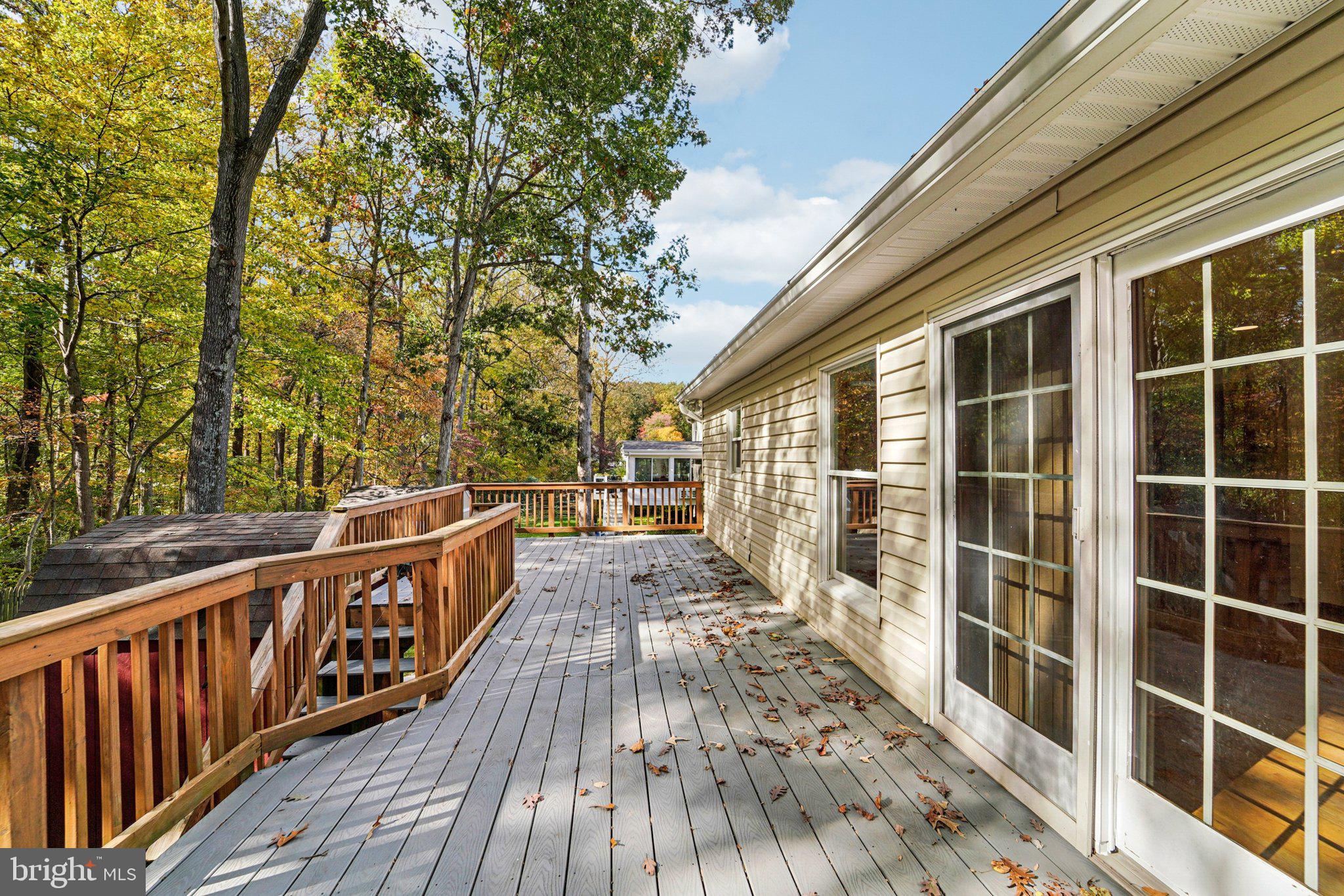 14820 Windmill Terrace Silver Spring, MD 20905 - Photo 28 of 33 a view of balcony with wooden floor and fence
