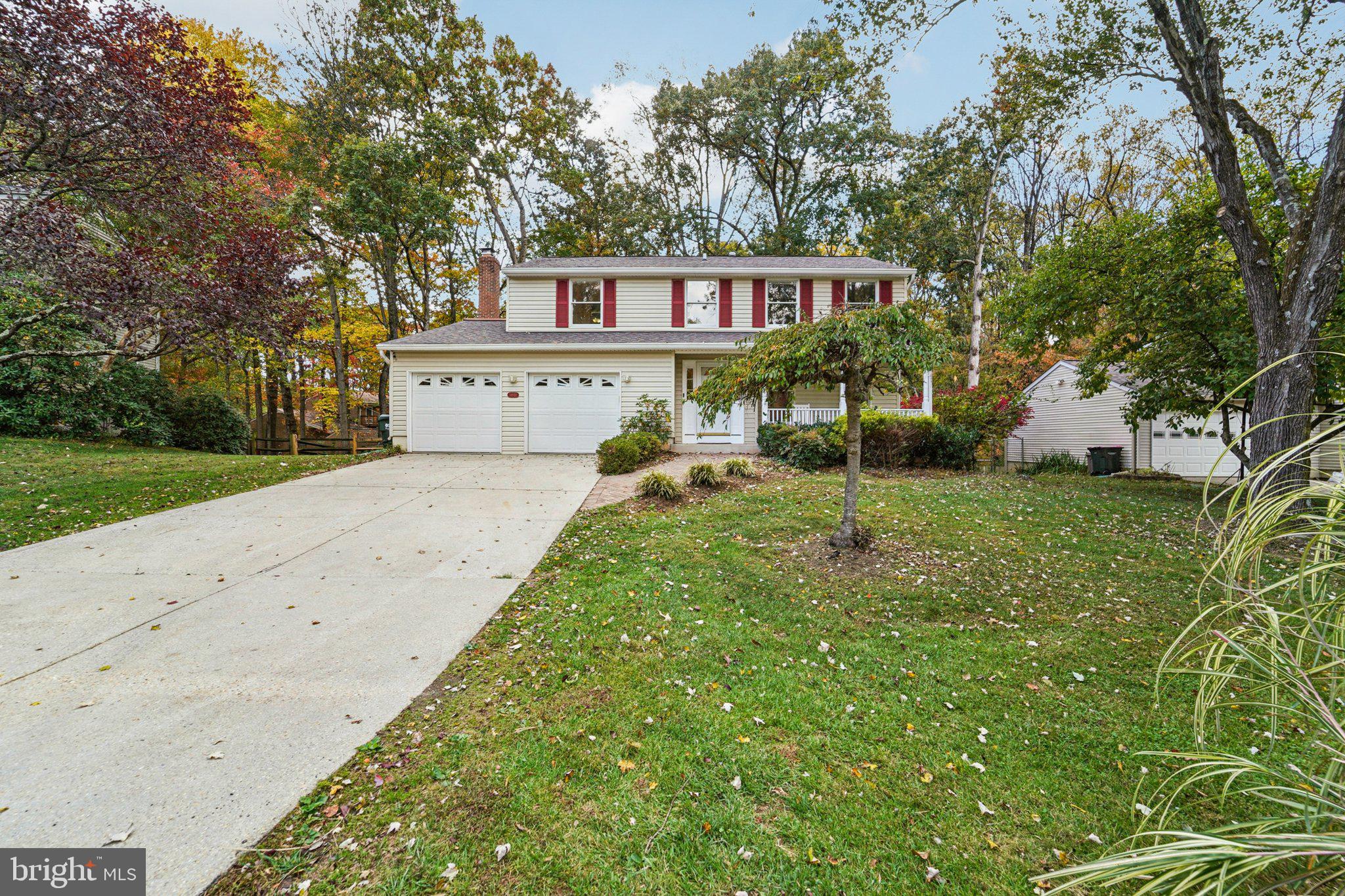 14820 Windmill Terrace Silver Spring, MD 20905 - Photo 4 of 33 a house view with garden space and trees