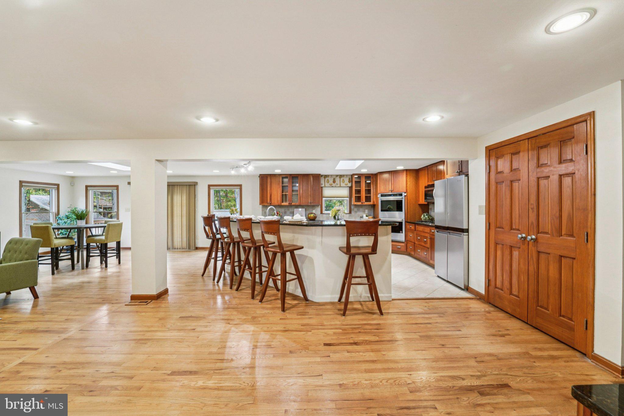 14820 Windmill Terrace Silver Spring, MD 20905 - Photo 10 of 33 a view of a kitchen with table and chairs