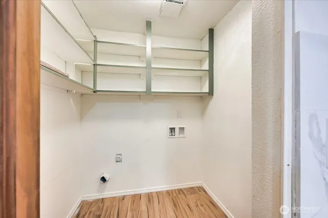 a view of a room with racks on the wall