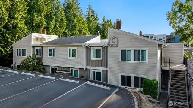 a front view of a house with yard