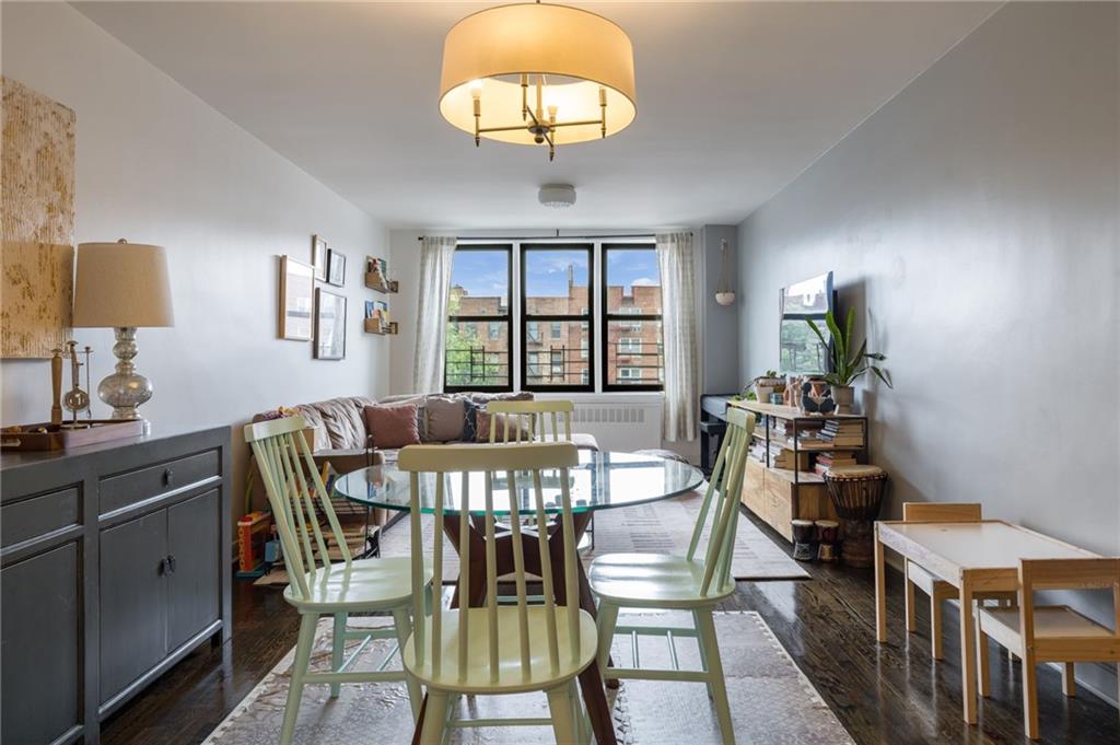 515 East 7th Street, Unit 5H Brooklyn, NY 11218 - Photo 3 of 17 a view of a dining room with furniture window and outside view