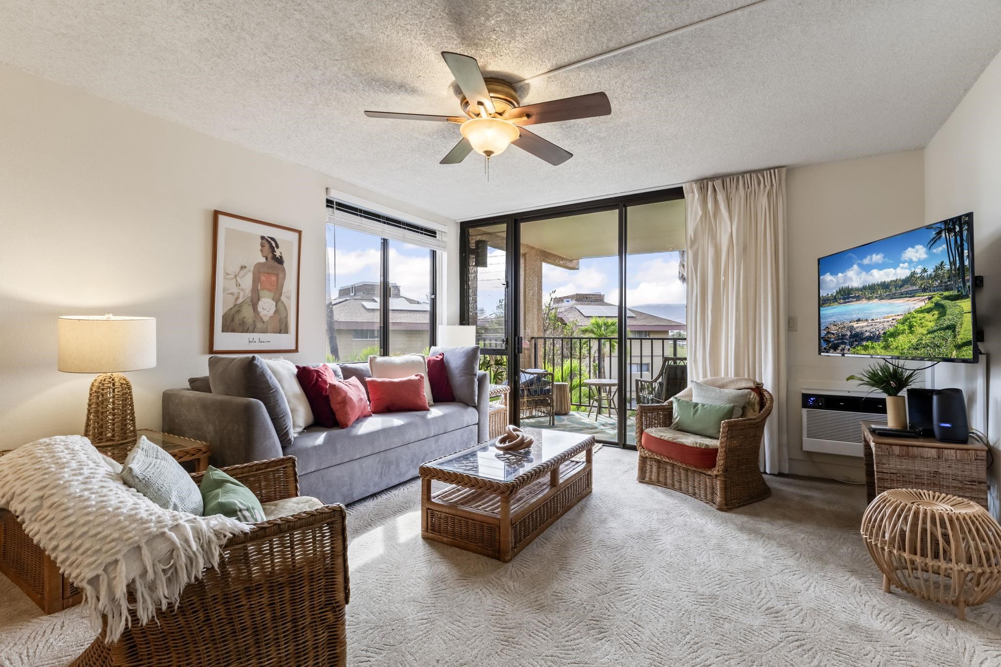 2695 South Kihei Road, Unit 4301 Kihei, HI 96753 - Photo 11 of 45 a living room with furniture and a large window with outer view