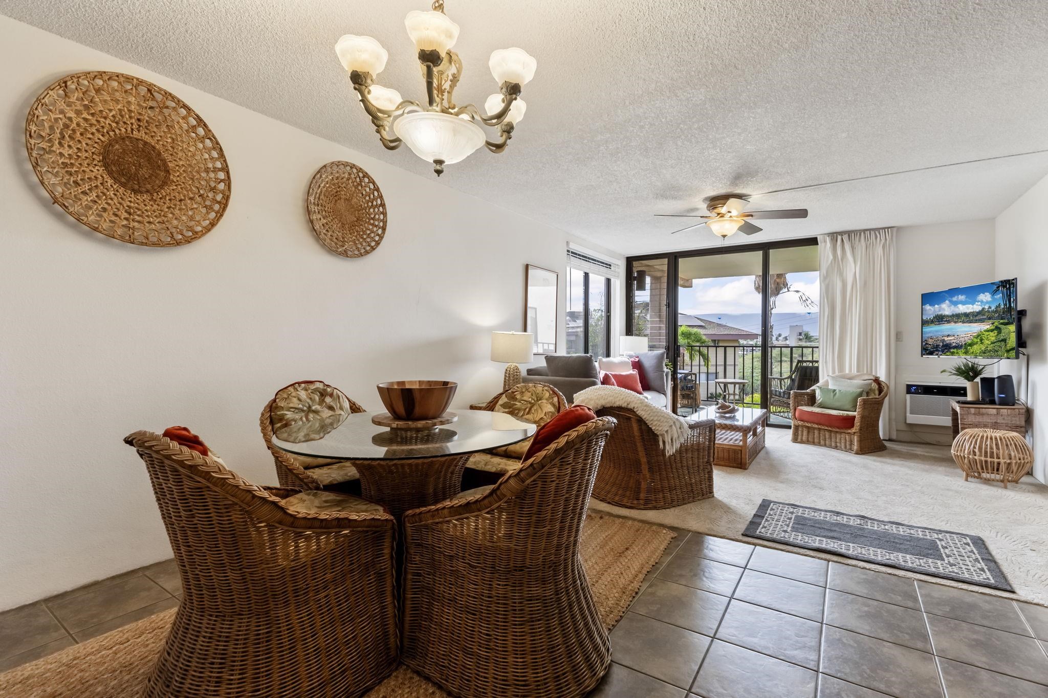 2695 South Kihei Road, Unit 4301 Kihei, HI 96753 - Photo 20 of 45 a living room with furniture and a large window