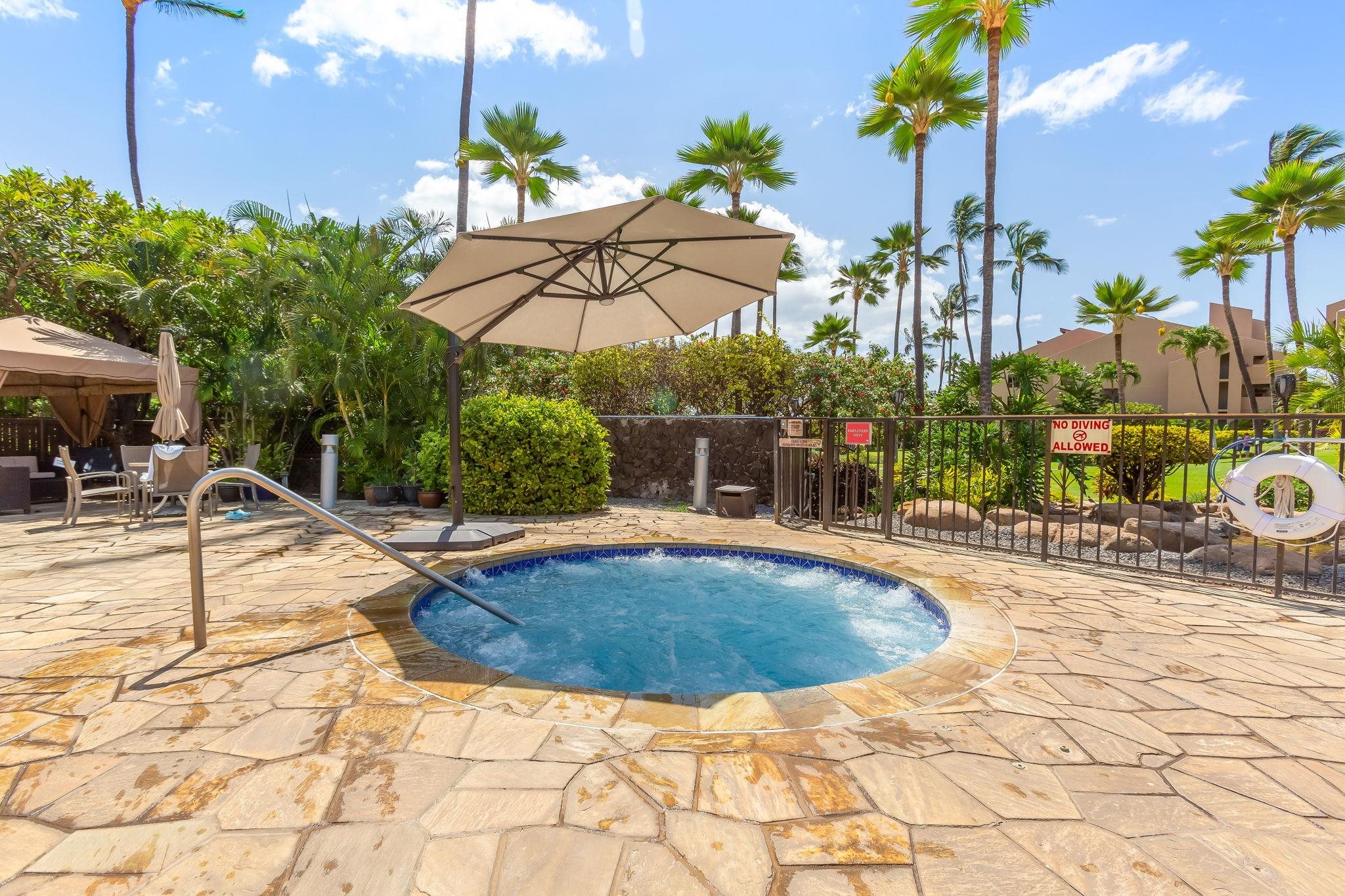 2695 South Kihei Road, Unit 4301 Kihei, HI 96753 - Photo 31 of 45 a view of a backyard with swimming pool