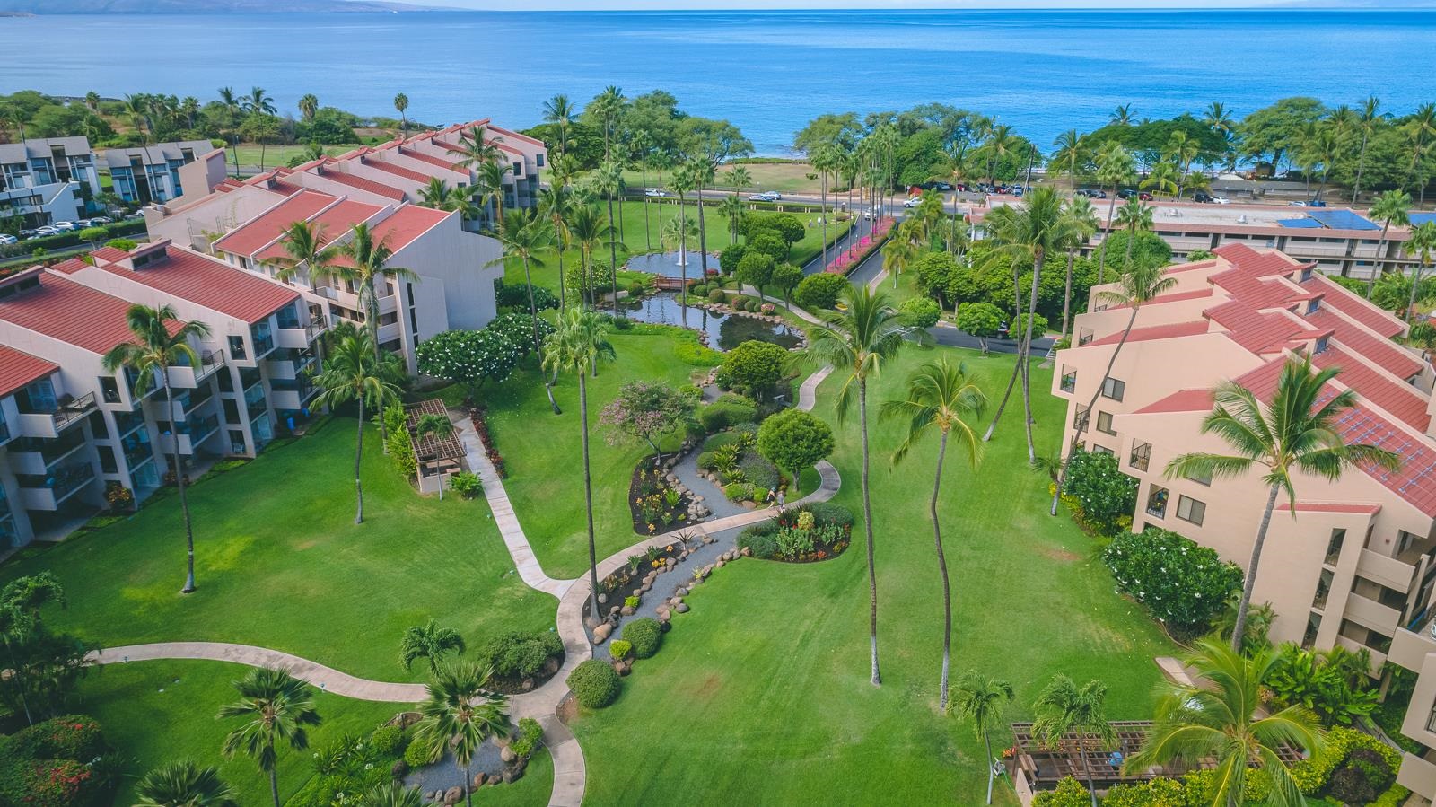 2695 South Kihei Road, Unit 4301 Kihei, HI 96753 - Photo 38 of 45 an aerial view of multiple houses with yard