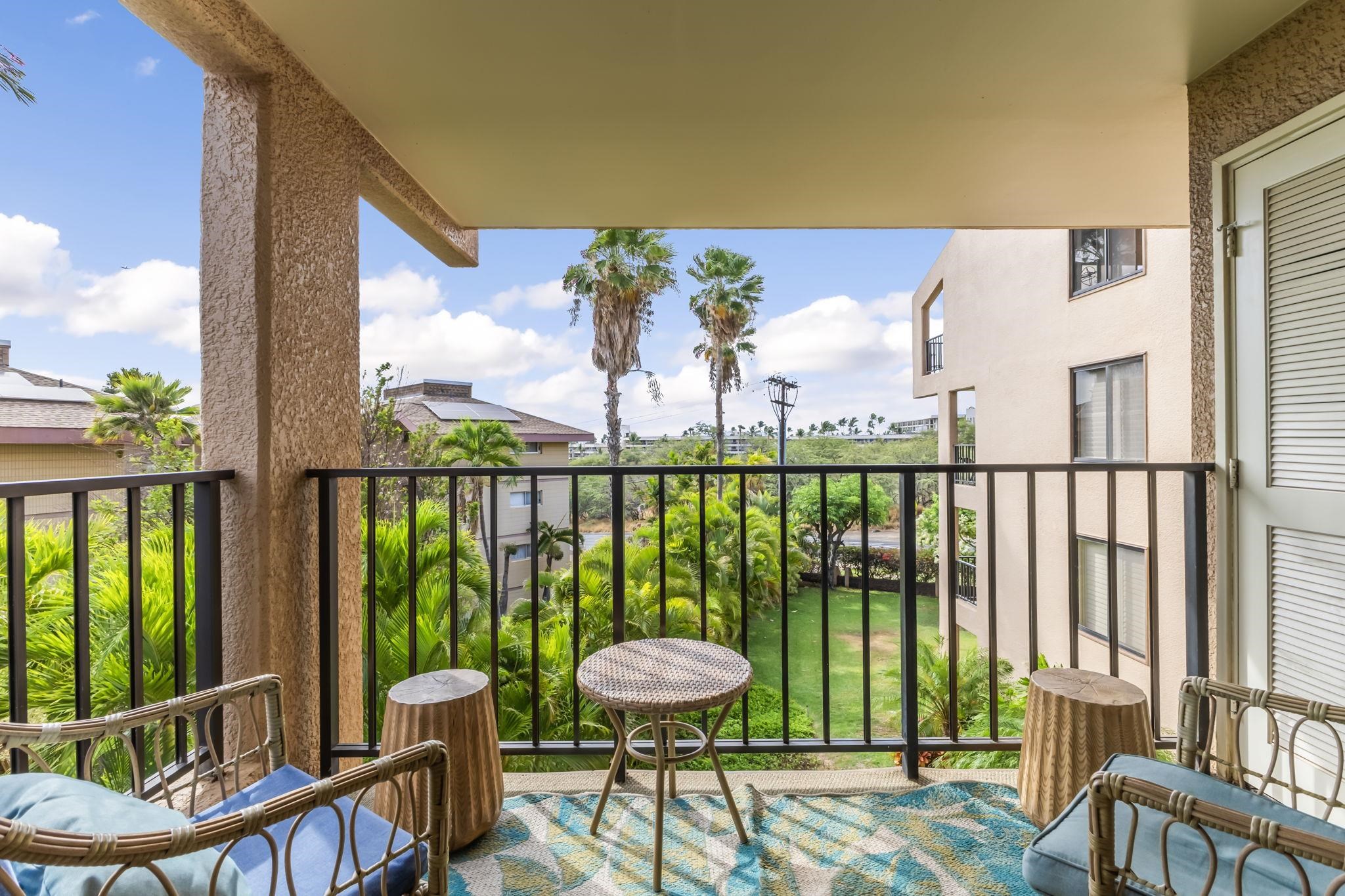 2695 South Kihei Road, Unit 4301 Kihei, HI 96753 - Photo 10 of 45 a view of a balcony with furniture and a potted plant