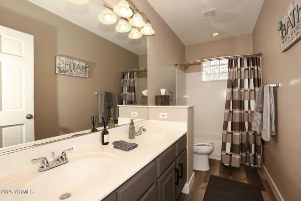 a room with a sink and a fireplace