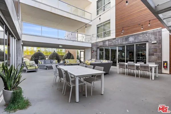 a balcony with furniture and a couch