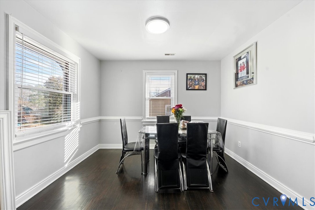 3930 Patsy Ann Drive Richmond, VA 23234 - Photo 11 of 36 Dining room with dark wood-style floors and basebo